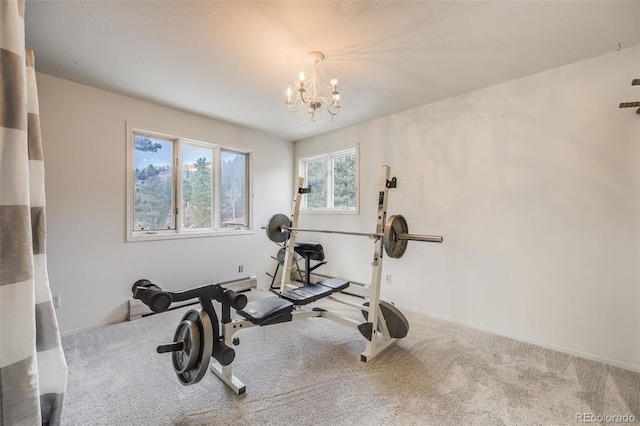 11531 S Deer Creek Rd, Littleton, CO 80127 - exercise area with a chandelier and carpet flooring