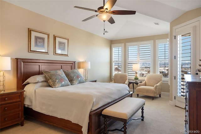 bedroom with ceiling fan, access to exterior, light colored carpet, and lofted ceiling