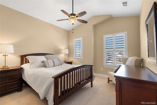 carpeted bedroom featuring ceiling fan and lofted ceiling