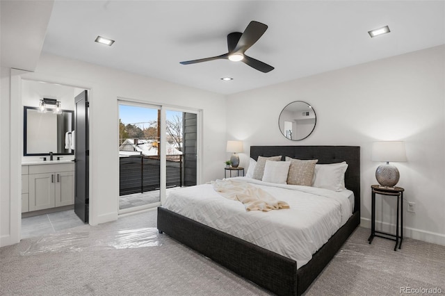 535 Josephine St, Denver, CO 80206 - bedroom with access to outside, light colored carpet, baseboards, a sink, and ensuite bathroom