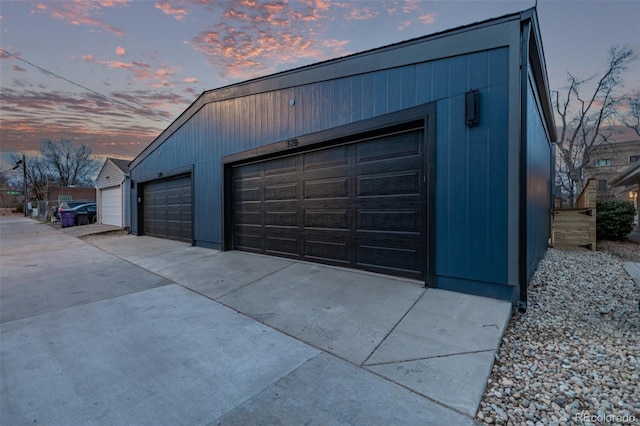 535 Josephine St, Denver, CO 80206 - garage at dusk featuring a detached garage