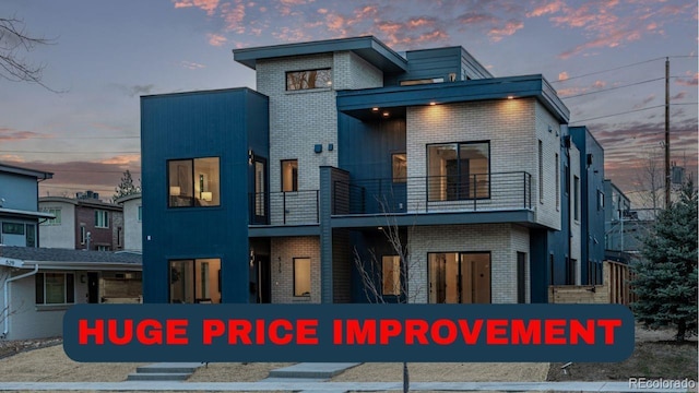 535 Josephine St, Denver, CO 80206 - back of property featuring brick siding and a balcony