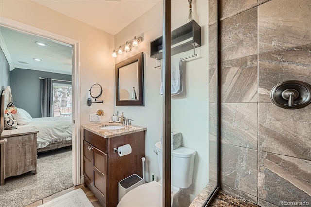 ensuite bathroom featuring vanity, toilet, recessed lighting, and ensuite bathroom