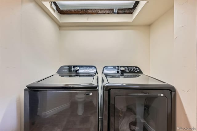 laundry area featuring washing machine and dryer and laundry area