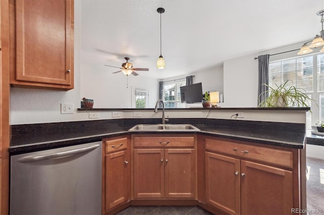 17388 Nature Walk Trl Unit 202, Parker, CO 80134 - kitchen featuring dishwasher, a ceiling fan, brown cabinets, and decorative light fixtures