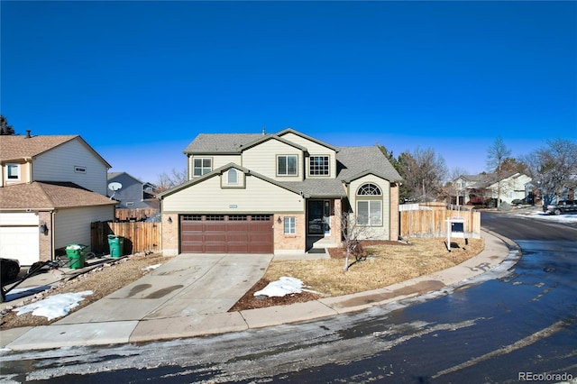 view of front of property with a garage