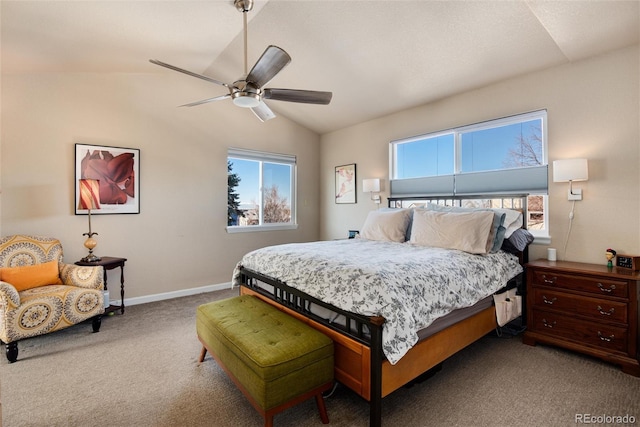 bedroom with vaulted ceiling, carpet flooring, and ceiling fan