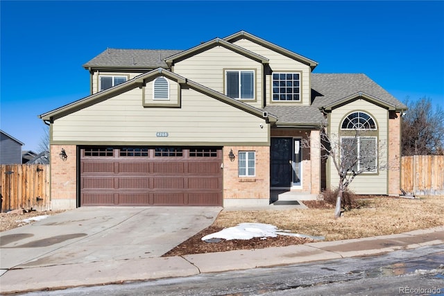 front of property with a garage