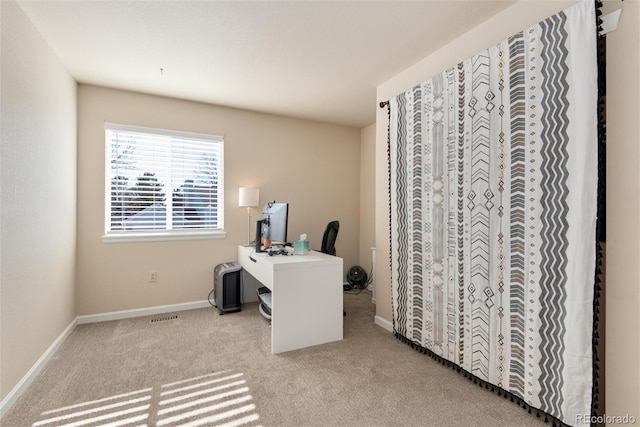 view of carpeted office space