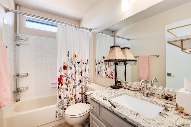 full bathroom featuring vanity, toilet, and shower / bath combo