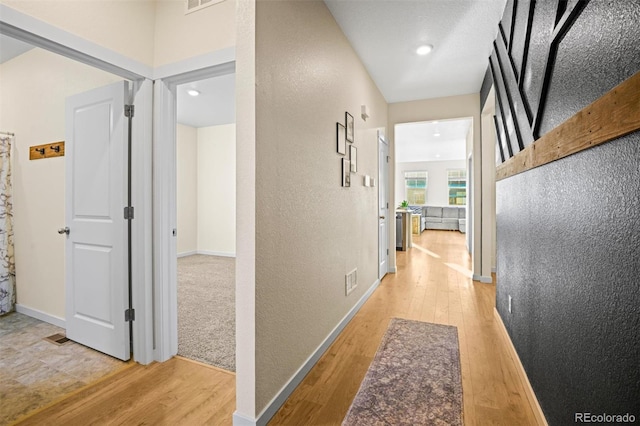 hall featuring light wood-type flooring