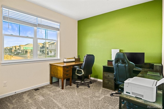 view of carpeted office space