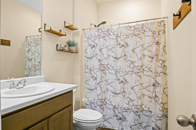 full bathroom with vanity, toilet, and shower / bath combo with shower curtain