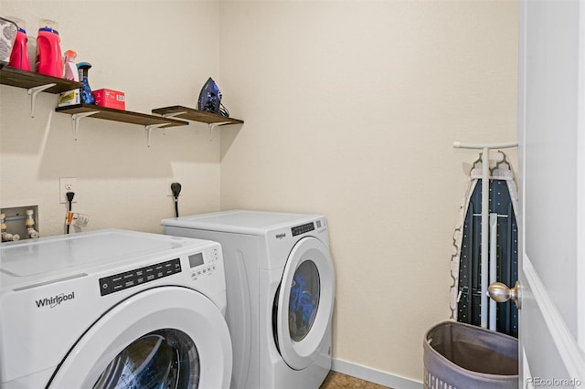 laundry room featuring independent washer and dryer