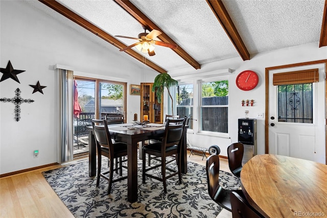 214 Poppy St, Golden, CO 80401 - dining room with a textured ceiling, ceiling fan, wood finished floors, and baseboards