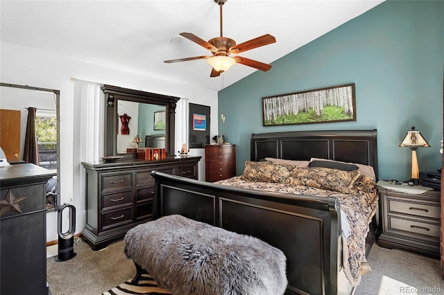 214 Poppy St, Golden, CO 80401 - carpeted bedroom featuring vaulted ceiling and a ceiling fan