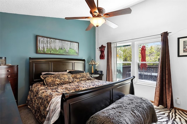 214 Poppy St, Golden, CO 80401 - carpeted bedroom with baseboards and ceiling fan
