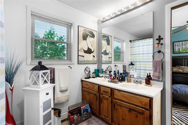 214 Poppy St, Golden, CO 80401 - full bathroom with double vanity, crown molding, and a shower with shower curtain
