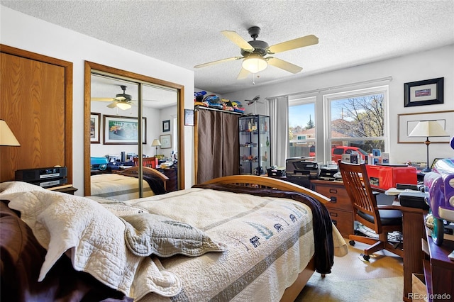 214 Poppy St, Golden, CO 80401 - bedroom with a closet, a textured ceiling, and ceiling fan
