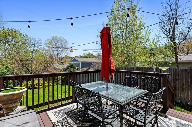 214 Poppy St, Golden, CO 80401 - wooden deck with outdoor dining space