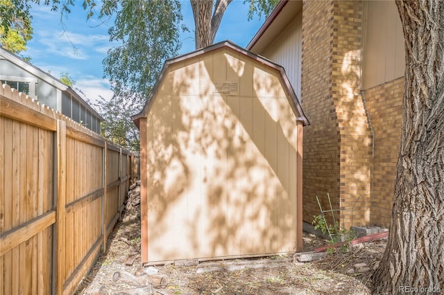 view of home's exterior with a shed