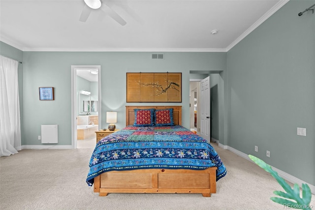 bedroom with ornamental molding, light carpet, ensuite bathroom, and ceiling fan