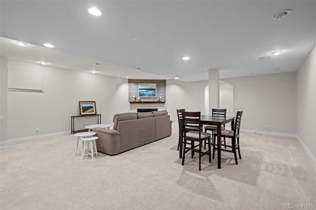 dining space with light carpet