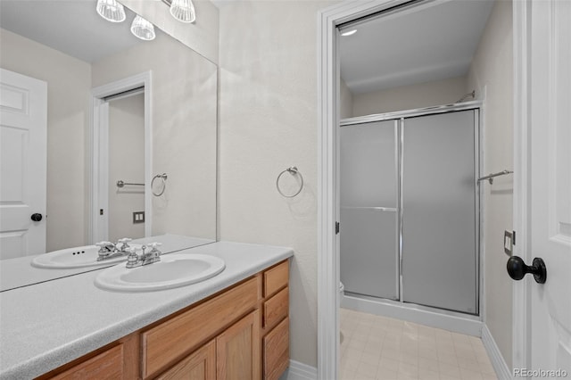 bathroom featuring vanity, an enclosed shower, tile patterned flooring, and toilet