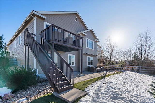 rear view of property with a patio