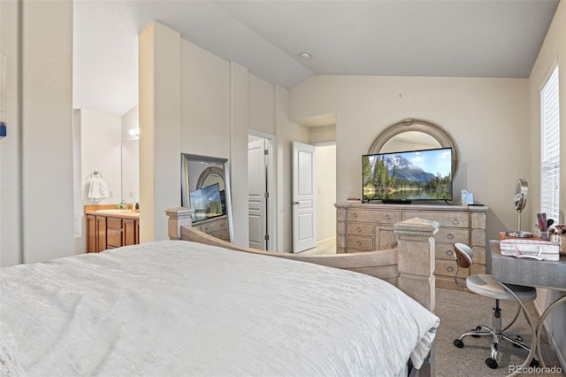 bedroom with vaulted ceiling