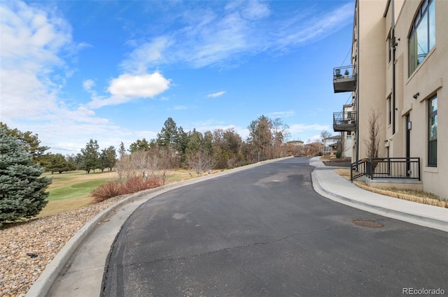 view of street with curbs and sidewalks