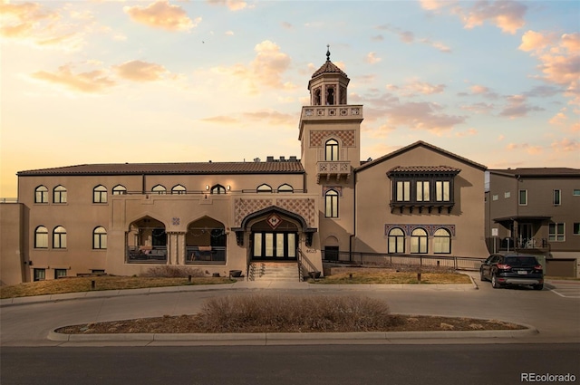 view of property at dusk