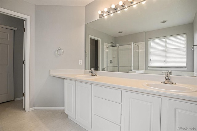 5755 S Zante Cir, Aurora, CO 80015 - bathroom with a stall shower and double vanity