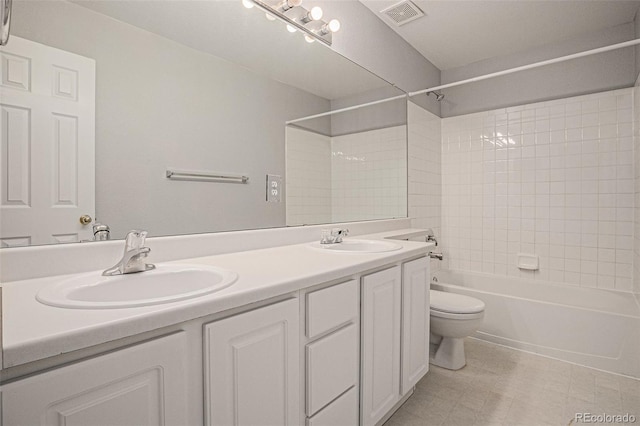 5755 S Zante Cir, Aurora, CO 80015 - full bathroom featuring double vanity and  shower combination