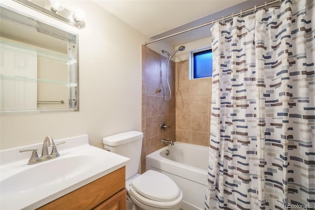 full bathroom featuring vanity, toilet, and shower / bath combo with shower curtain