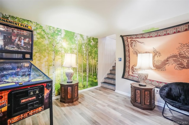 playroom with light wood-type flooring