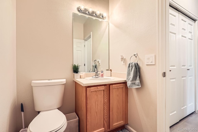 5255 Memphis St Unit 311, Denver, CO 80239 - bathroom with vanity and toilet