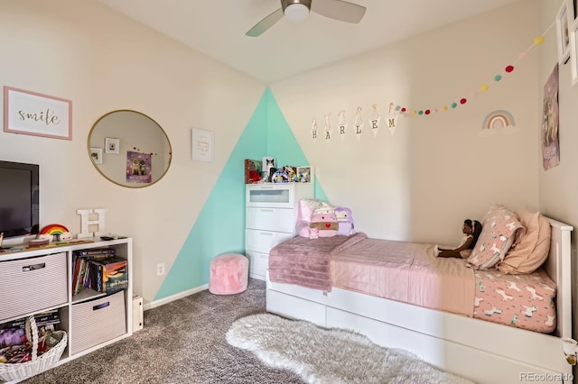 5255 Memphis St Unit 311, Denver, CO 80239 - bedroom featuring carpet flooring, baseboards, and ceiling fan