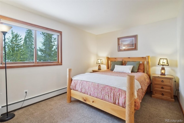 bedroom with a baseboard radiator and carpet floors