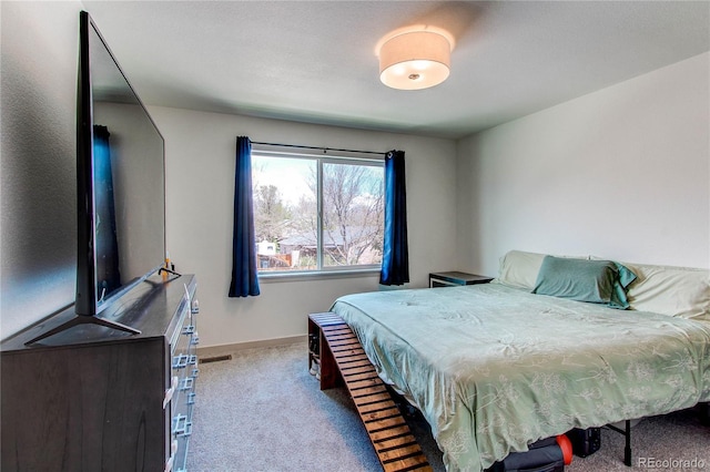 1075 Spartan Ave, Berthoud, CO 80513 - bedroom featuring baseboards, carpet flooring, and visible vents