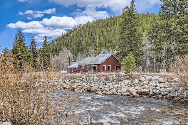 1350 Tolland Rd, Rollinsville, CO 80474 - view of home's exterior with a forest view