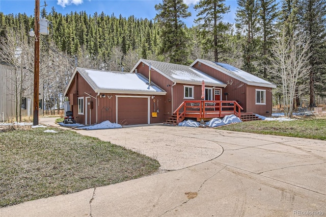 1350 Tolland Rd, Rollinsville, CO 80474 - view of front of home with a garage, driveway, and a deck