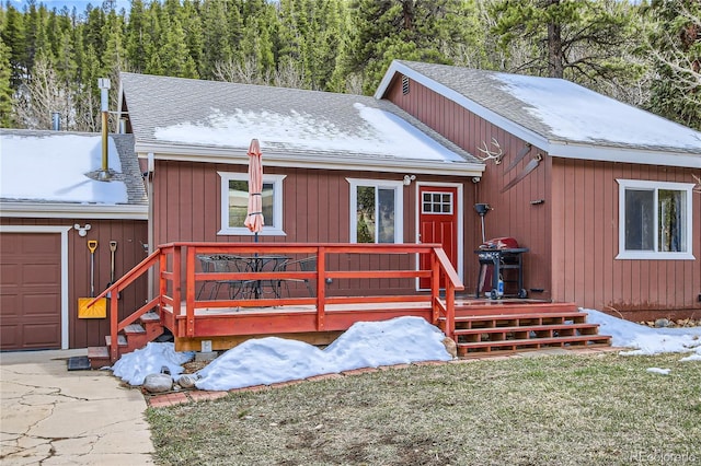 1350 Tolland Rd, Rollinsville, CO 80474 - rustic home with a deck and roof with shingles