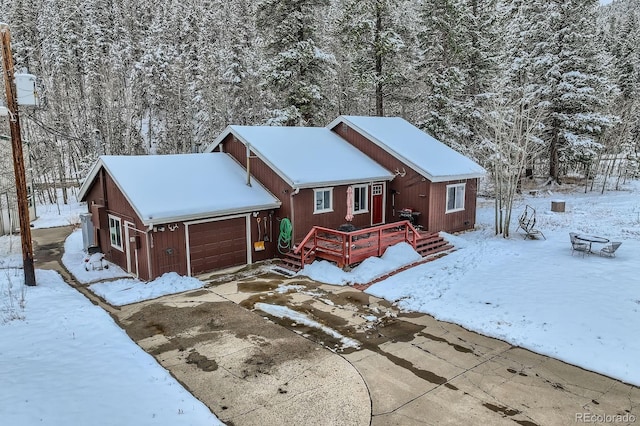 1350 Tolland Rd, Rollinsville, CO 80474 - chalet / cabin with a deck and an attached garage