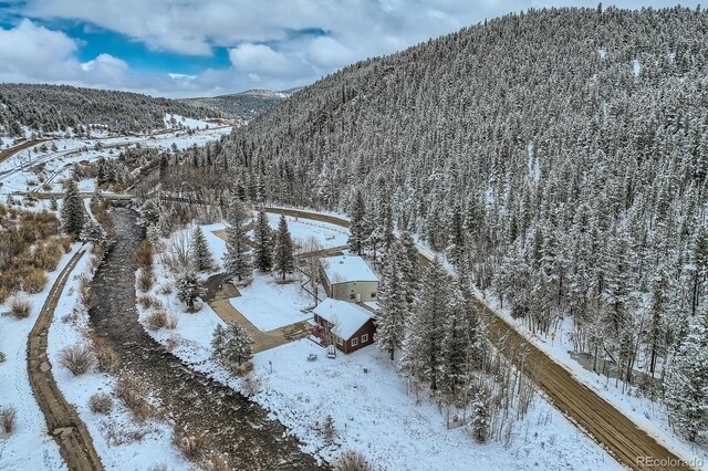1350 Tolland Rd, Rollinsville, CO 80474 - snowy aerial view featuring a mountain view