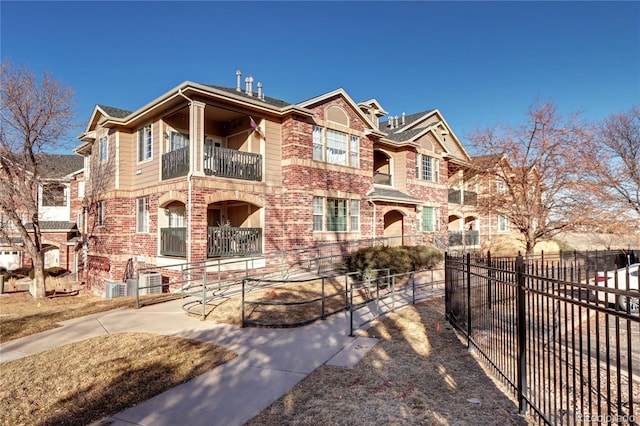 view of front of property with a balcony