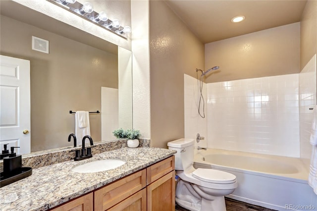 full bathroom with vanity, toilet, and shower / bath combination