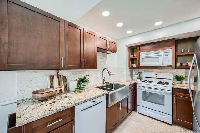 494 Owl Dr Unit 4, Louisville, CO 80027 - kitchen with white appliances, a sink, open shelves, decorative backsplash, and recessed lighting