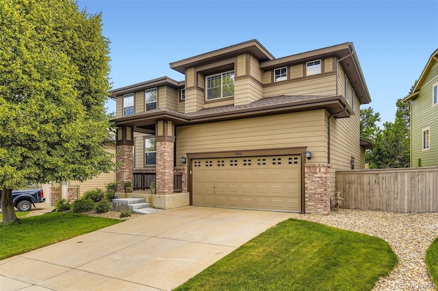 3490 Craftsbury Dr, Highlands Ranch, CO 80126 - prairie-style house featuring brick siding, an attached garage, and concrete driveway