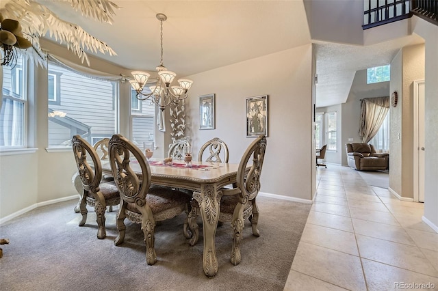 3490 Craftsbury Dr, Highlands Ranch, CO 80126 - dining area featuring a chandelier, light colored carpet, and light tile patterned flooring